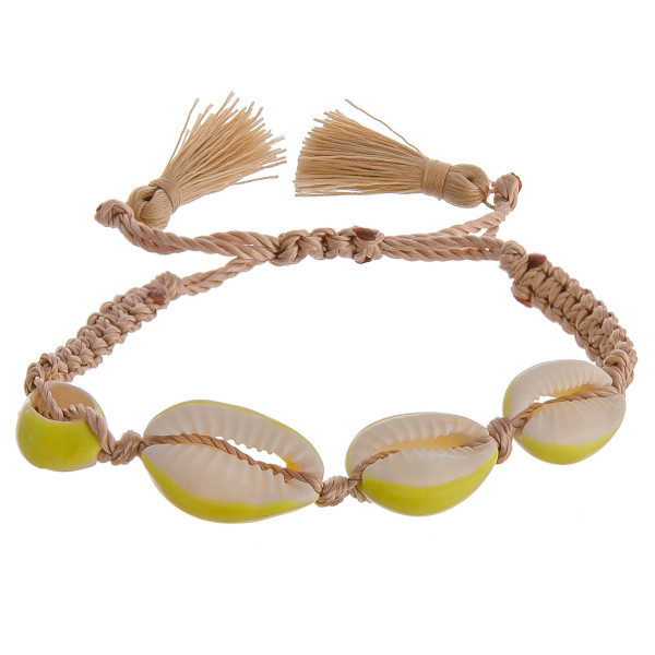 Wholesale fabric bolo bracelet Puka shell accents fan tassel detailing diameter