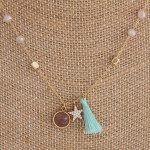 Wholesale short blush beaded necklace star accent fanned tassel