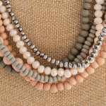 Wholesale layered necklace wood iridescent beaded details