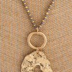 Wholesale long beaded necklace iridescent bead details crinkled metal pendant go