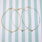 Wholesale dainty seed beaded necklace two star accents cubic zirconia details