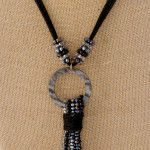 Wholesale faux leather necklace faceted beaded tassel detail resin accent Pendan