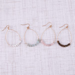 Wholesale metal teardrop earrings white natural stone beaded details
