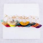 Wholesale dainty teardrop earrings tassel details gold accents