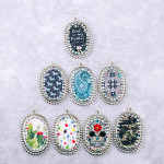 Wholesale metal drop earrings faux leather western horse print center detail rhi